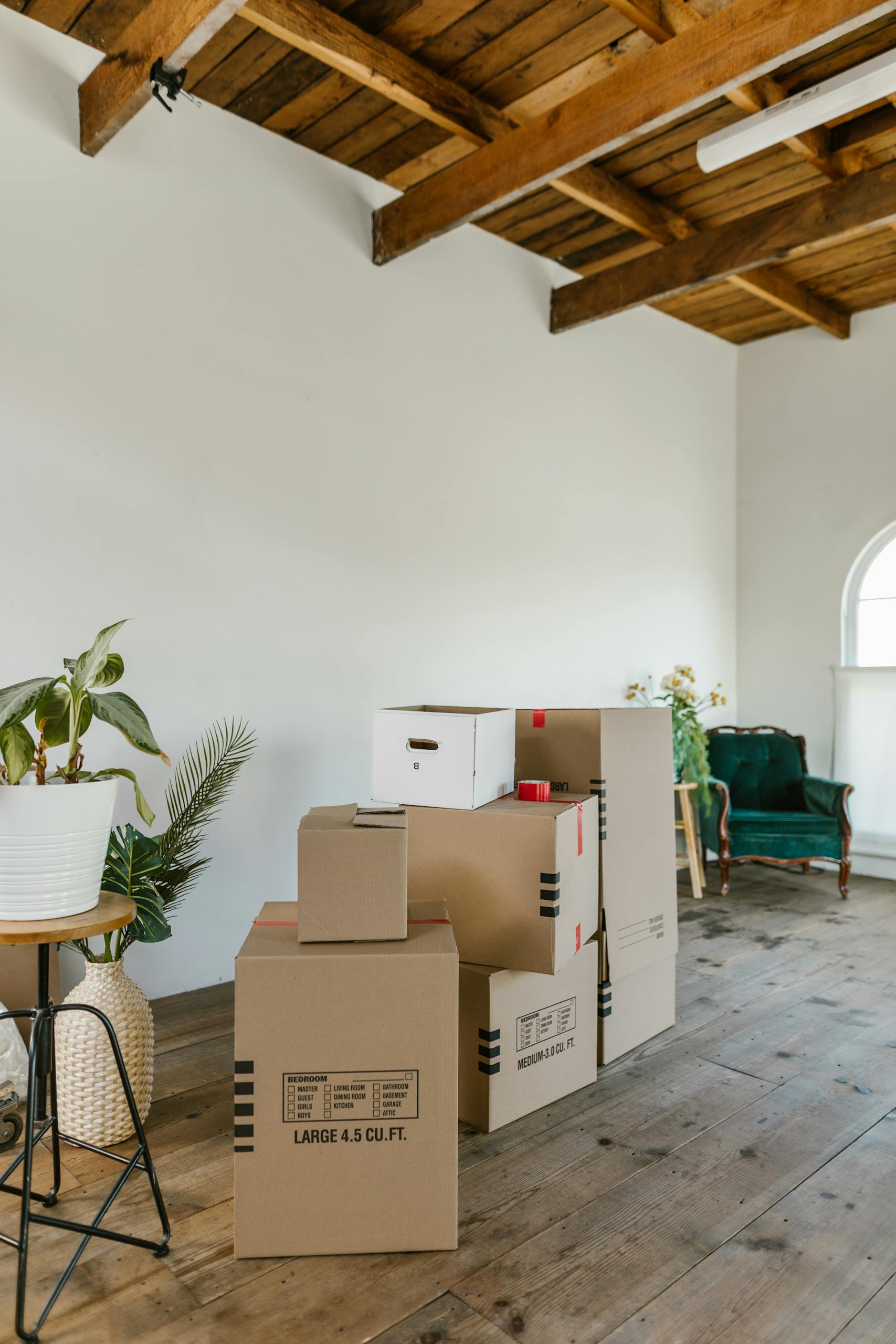 Cardboard Boxes on Wooden Floor